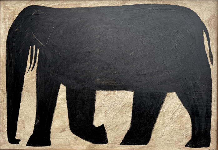 Framed artwork of a black elephant silhouette on a beige background